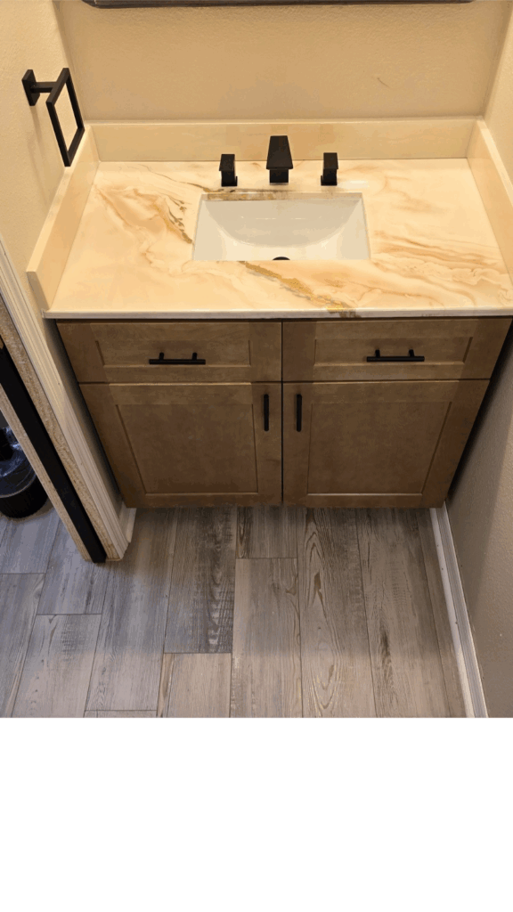 Metallic epoxy bathroom countertop; pearl white, brown, and gold highlights